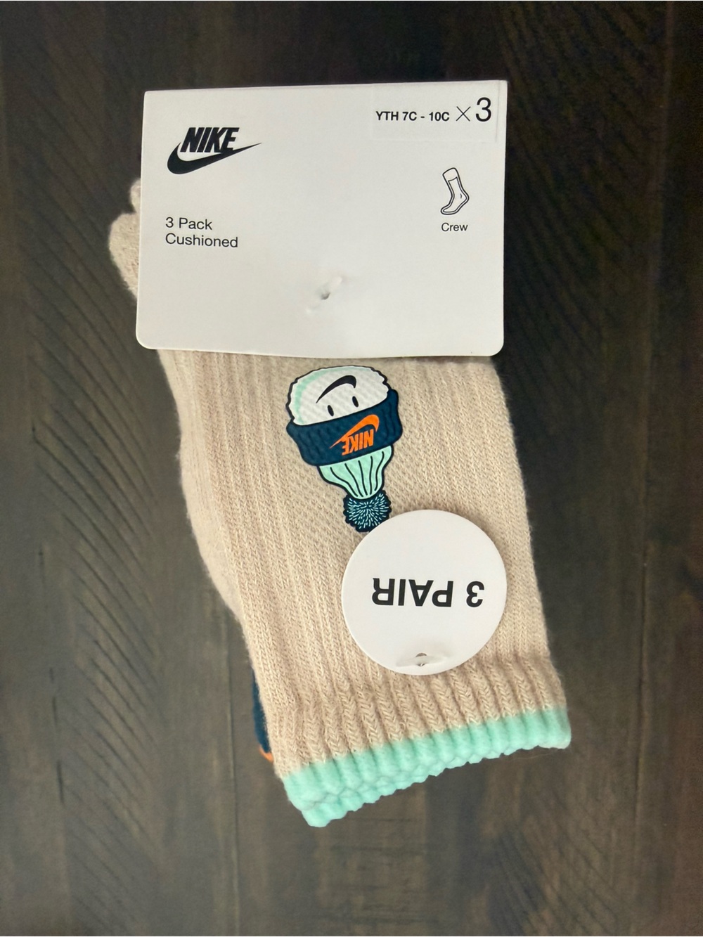 Nike small Kids Crew Socks in Cream with Teal Trim and Navy Logo 3 pack
